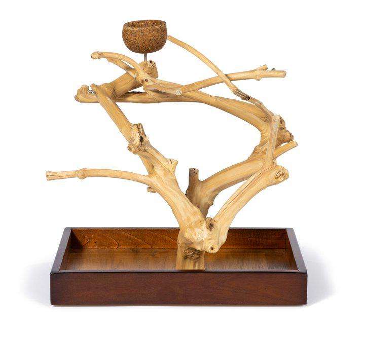 Decorative piece with wooden branches and a bowl on a white background