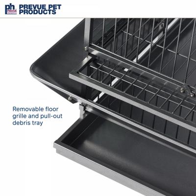 Pet cage with removable floor grille and pull-out debris tray, Prevue Pet Products branding visible.