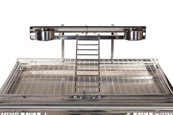 Stainless steel pet cage with multiple levels and a ladder on a white background